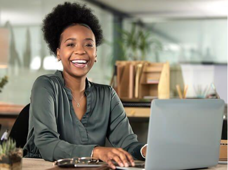 Woman using a laptop.
